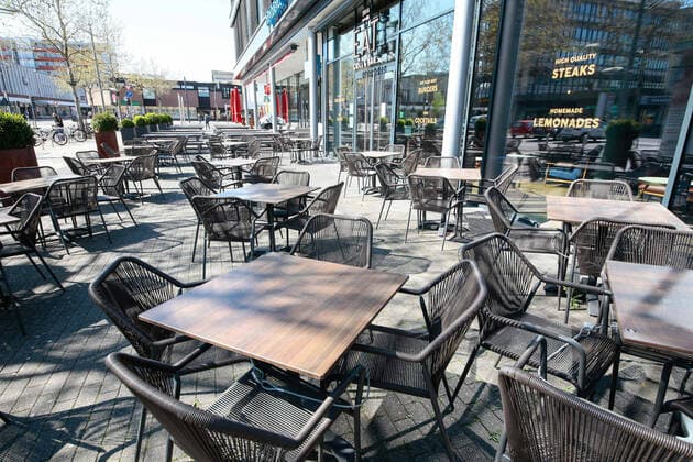 22 04 2020, xtgx, Mandatory masks in Wolfsburg, Empty tables and chairs in a restaurant in Wolfsburg The catering trade is still not allowed to open but only to offer out-of-home sales The city of Wolfsburg has introduced mandatory masks in local public transport, public buildings and shops as of this week Every passenger or visitor must