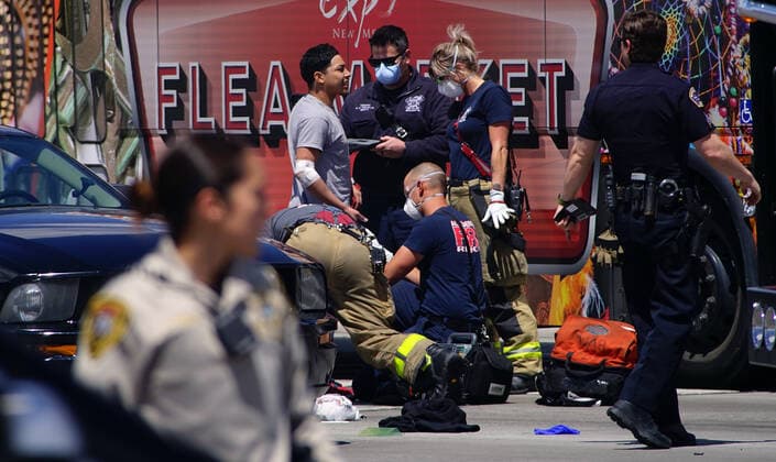April 22, 2020, Albuquerque, NEW MEXICO, USA: 042220 ..Paramedics tend to victim at the scene of a shooting at Central and Unser as APD officers and BCSO deputies start investigating .Photographed on Wednesday April 22, 2020.Adolphe Pierre-LouisJournal. Albuquerque USA - ZUMAab1_ 20200422_zaf_ab1_011 Copyright: xAlbuquerquexJournalx
