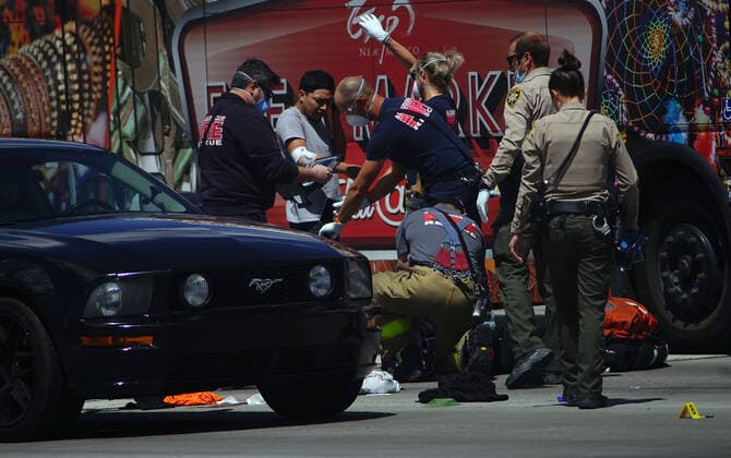 April 22, 2020, Albuquerque, NEW MEXICO, USA: 042220 ..Paramedics tend to victim at the scene of a shooting at Central and Unser as APD officers and BCSO deputies start investigating .Photographed on Wednesday April 22, 2020.Adolphe Pierre-LouisJournal. Albuquerque USA - ZUMAab1_ 20200422_zaf_ab1_013 Copyright: xAlbuquerquexJournalx