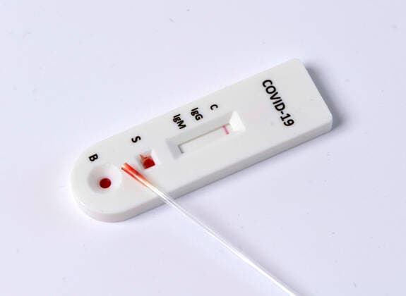 23 04 2020, ONE used COVID 19 antibody test kit for self-testing in the home Use at the kitchen table, with the sterile disposable capillary you suck a drop of blood from you