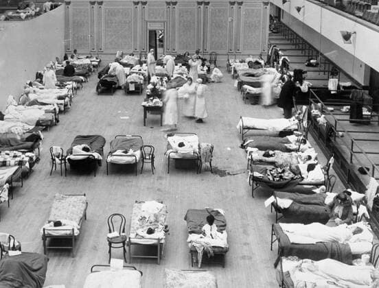Camp Funston OAKLAND, CALIFORNIA, USA -- circa 1918 -- During the 1918 flu epidemic, the Oakland Municipal Auditorium was used as a temporary hospital. The photograph depicts volunteer nurses from the American Red Cross caring for influenza sufferers in the Oakland Auditorium, Oakland, California, USA during the influenza pandemic of 1918-1920. The Spanish Flu - as it commonly became known - infected around 500 million people around the world and led to the deaths of between 17-100 million, making it one of the deadliest pandemics in history --, United States on. *** Camp Funston OAKLAND, CALIFORNIA, USA circa 1918 During the 1918 flu epidemic, the Oakland Municipal Auditorium was used as a temporary hospital The photograph depicts volunteer nurses from the American Red Cross caring for influenza sufferers in the Oakland Auditorium, Oakla  EP_ATL 