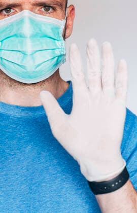 Portrait of man wearing mask and protective gloves model released Symbolfoto JCMF00495