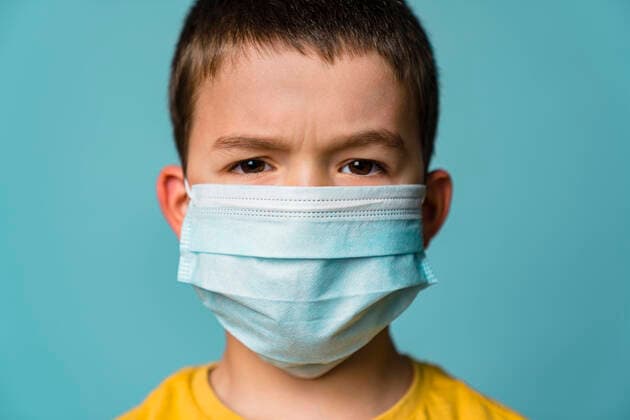 Portrait of boy with mask model released Symbolfoto property released MGIF00886