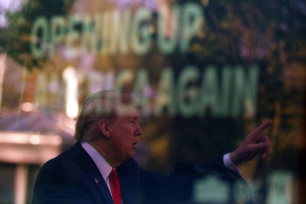 President Donald Trump is seen reflected in a television monitor as he speaks on the COVID-19 pandemic at a Coronavirus Task Force briefing in the Rose Garden at the White House in Washington, D.C. on Monday, April 27, 2020.  WAX20200427407 YURIxGRIPAS