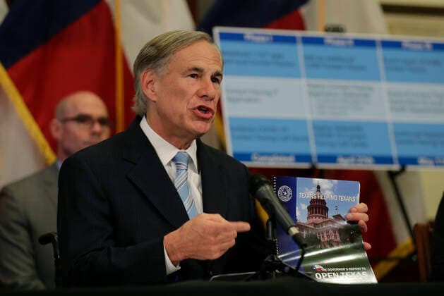 Apr 27, 2020 - Austin, Texas, USA - Texas Gov. GREG ABBOTT holds the Governors Report to Reopen Texas book during a news conference where he announced he would relax some restrictions imposed on some businesses due to the COVID-19 pandemic, Monday,. Austin USA - ZUMAd150 20200427_new_d150_001 Copyright: xEricxGayx