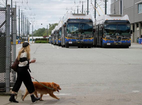 (200427) -- VANCOUVER, April 27, 2020 (Xinhua) -- Buses are parked at the Vancouver Transit Center in Vancouver, Canada, April 27, 2020. Metro Vancouver s transportation authority TransLink announced on Monday that it is laying off 1,492 workers with further reduction in services due to the massive downturn in ridership during the COVID-19 pandemic. As of Monday afternoon, there were 48,230 confirmed COVID-19 cases in Canada and 2,701 deaths. (Photo by Liang Sen Xinhua) CANADA-VANCOUVER-COVID-19-JOB CUTS 