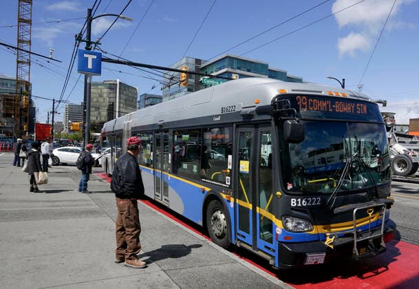 (200427) -- VANCOUVER, April 27, 2020 (Xinhua) -- Passengers wait for bus on a street in Vancouver, Canada, April 27, 2020. Metro Vancouver s transportation authority TransLink announced on Monday that it is laying off 1,492 workers with further reduction in services due to the massive downturn in ridership during the COVID-19 pandemic. As of Monday afternoon, there were 48,230 confirmed COVID-19 cases in Canada and 2,701 deaths. (Photo by Liang Sen Xinhua) CANADA-VANCOUVER-COVID-19-JOB CUTS 