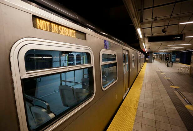 (200427) -- VANCOUVER, April 27, 2020 (Xinhua) -- A not-in-service train is seen inside a Skytrain station in Vancouver, Canada, April 27, 2020. Metro Vancouver s transportation authority TransLink announced on Monday that it is laying off 1,492 workers with further reduction in services due to the massive downturn in ridership during the COVID-19 pandemic. As of Monday afternoon, there were 48,230 confirmed COVID-19 cases in Canada and 2,701 deaths. (Photo by Liang Sen Xinhua) CANADA-VANCOUVER-COVID-19-JOB CUTS 