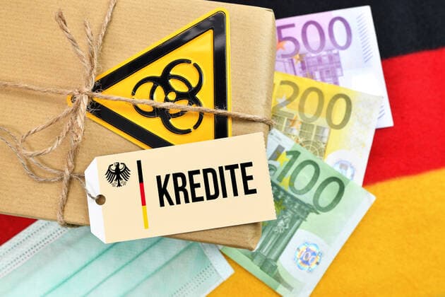 PHOTOMONTAGE, package with biohazard signs on German flag with label and the inscription credits ** NUR FUER REDAKTIONELLE ZWECKE ** EDITORIAL USE ONLY **