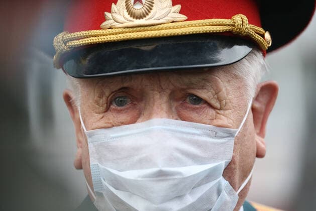 ST PETERSBURG, RUSSIA - APRIL 30, 2020 Mikhail Polyachkov, a WWII veteran, during a private parade arranged for him as part of the Supporting Veterans initiative to mark the forthcoming Victory Day This year, Russia is celebrating the 75th anniversary of the victory over Nazi Germany in the Great Patriotic War of 1941-1945 the Eastern Front of World War II Peter Kovalev Private parade for WWII veteran in St Petersbu