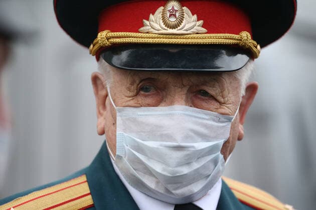 ST PETERSBURG, RUSSIA - APRIL 30, 2020 Mikhail Polyachkov, a WWII veteran, during a private parade arranged for him as part of the Supporting Veterans initiative to mark the forthcoming Victory Day This year, Russia is celebrating the 75th anniversary of the victory over Nazi Germany in the Great Patriotic War of 1941-1945 the Eastern Front of World War II Peter Kovalev Private parade for WWII veteran in St Petersbu