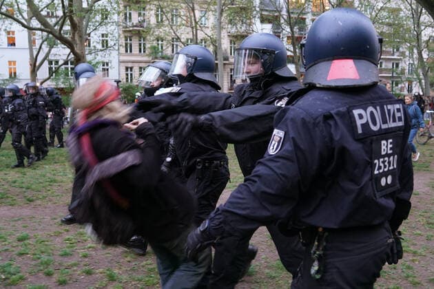 01 05 2020, Berlin, Germany, GER Impressions of the revolutionary May Day demonstration in Berlin Kreuzberg In the picture policemen pushing a demonstrator
