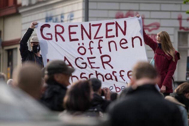 Berlin, Protest on 1 May Germany, Berlin 01 05 2020 In the picture demonstrators hold a banner high on Oranien Platz high Berlin Berlin Germany
