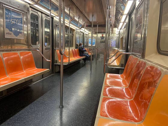 May 1, 2020, New York City, NY, U.S: A masked woman sits alone in an empty subway car. There is currently a problem with the safety and cleanliness of the subways, terminals, and transportation hubs in New York City during the COVID-19 Pandemic Outbreak. Governor Cuomo declared the subways shut down from 1am to 5am for deep cleaning on each train to control the spread of the outbreak for essential workers. There are an increased number of unmasked homeless people riding and sleeping on the trains. New York City U.S. - ZUMAk45_ 20200501_zaf_k45_024 Copyright: xKristaxKennellx