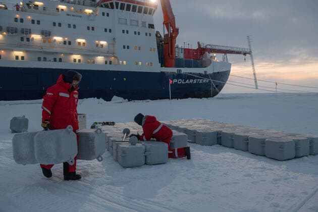 October 10, 2019, Arctic Sea, Arctic: Scientists building the platform of the temporary Ocean City next to research vessel Polarstern. MOSAiC is the largest polar expedition in history: in September 2019, the German research icebreaker Polarstern has set sail from Tromso, Norway, to spend a year drifting through the Arctic Ocean, trapped in ice. The goal of the MOSAiC expedition is to take the closest look ever at the Arctic as the epicenter of global warming and to gain fundamental insights that are key to better understand global climate change. Hundreds of researchers from 20 countries are involved in this exceptional endeavor. Following in the footsteps of Fridtjof Nansen s ground-breaking expedition with his wooden sailing ship Fram in 1893-1896, the MOSAiC expedition will bring a modern research icebreaker close to the north pole - ZUMAz03_ 20191010_arc_z03_058 Copyright: xEstherxHorvathx