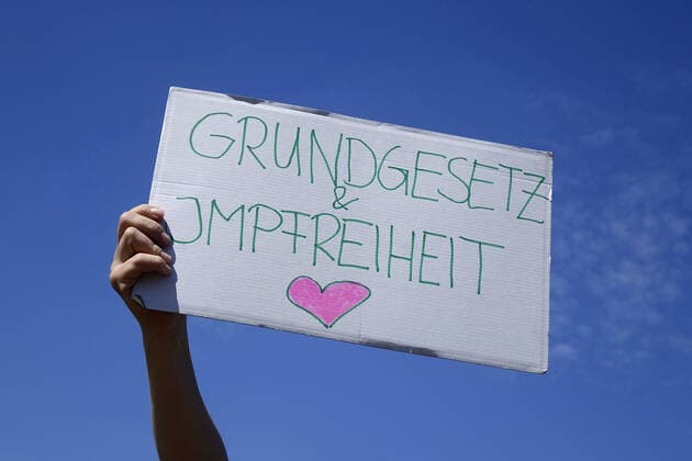Sign on demonstration Sign on demonstration, 09 05 2020, Tiergarten, Platz der Republik, Berlin, At a protest demonstration a woman holds up a sign