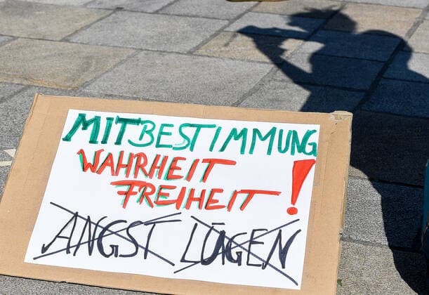 GER, Demo against Corona Rules in Bavaria 09 05 2020, Hildegardplatz, Kempten, GER, Demo against Corona Rules in Bavaria, 300 people demonstrated peacefully in a cordoned off area in front of the Basilica St Lorenz against the current Corona Rules The demonstrators mainly followed the distance rules The police showed presence, but kept back and was satisfied nph00200