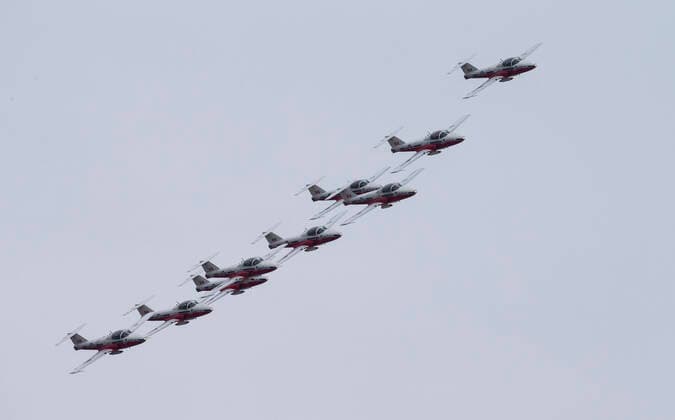 (200510) -- TORONTO, May 10, 2020 -- A formation of the Canadian Forces Snowbirds fly as part of their Operation Inspiration Tour during the COVID-19 outbreak over Toronto, Canada, on May 10, 2020. From the first weekend of May, the cross-country tour is expected to salute Canadians doing their part to fight the spread of COVID-19. (Photo by Xinhua) CANADA-TORONTO-COVID-19-SNOWBIRDS-FLYOVER ZouxZheng 