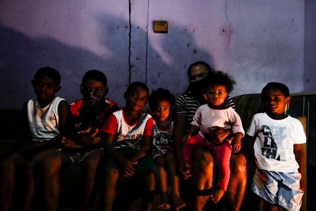 May 11, 2020, Sao Paulo, SP, Brazil: RAIMUNDA, 57 years old, isolated in her home since March 23, when the quarantine was installed in the city of Sao Paulo to combat the outbreak of COVID-19 She takes care of 6 grandchildren, all with comorbidities and who are part of the group of risk for the disease. She worked as a waste picker and now lives without income and twice denied the federal government s request for emergency aid. Sao Paulo Brazil - ZUMAc168 20200511_zap_c168_001 Copyright: xMarceloxChellox