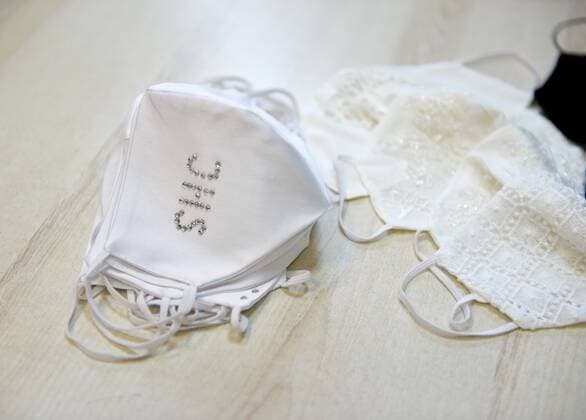 Wedding and First Communion face masks are made during the coronavirus outbreak in Poland Wedding and First Communion face masks are made during the coronavirus outbreak by Elus sewing workshop on May 12, 2020 in Jaroslaw, Poland. EN_01428317_0026 