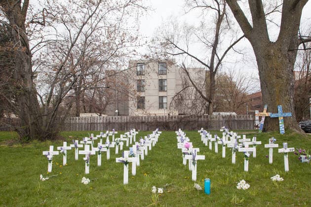 May 12, 2020, Toronto, Ontario, Canada: COVID-19 outbreaks in Long-Term Care facilities are one of the major concerns of the coronavirus pandemic in Canada. The Ministry of Long-Term Care of the province reports more than 1,200 deaths due to the virus inside Long-Term Care in Ontario. Long-Term care in houses in Canada have long been targeted for misconducts and unsatisfactory services, with underpaid temporary staff and public criticism from relatives and specialists. In the photo, 50 crosses are laid out in front of a Long-Term Care facility in the Grand Toronto Area to represent the number of deaths of COVID-19 in this one facility only. Relatives are now concerned about the health of individuals and staff inside. Canada has now surpassed the number of 5,000 deaths due to COVID-19. Toronto Canada - ZUMAd114 20200512_zap_d114_001 Copyright: xJohnnyxDexFrancox