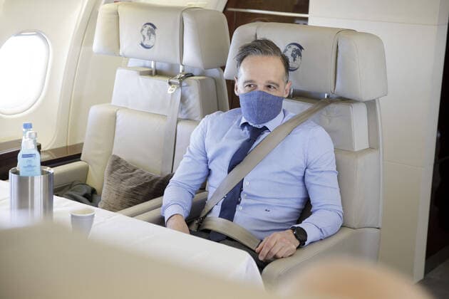 Federal Foreign Minister Heiko Maas, SPD, wears a nose mask on board an air force Airbus 16 05 2020 Schengen Luxembourg Copyright: xThomasxImo photothek.netx