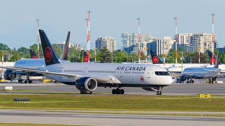 May 15, 2020, Richmond, British Columbia, Canada: Air Canada jets at Vancouver International Airport on May 15, 2020, the day Air Canada announced their decision to lay off approximately 20,000 employees in June. Richmond Canada - ZUMAs202 20200515_zap_s202_006 Copyright: xBaynexStanleyx