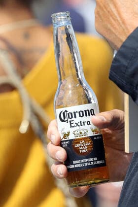 Demonstration against the restrictions during the Corona pandemic Demonstrators on Munichs Theresienwiese against the Corona restrictions Corona beer at the demonstration, Munich Bavaria Germany Thersienwiese
