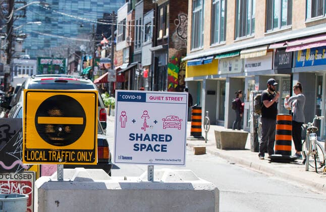 (200516) -- TORONTO, May 16, 2020 -- A notice of Quiet Street is seen at the entrance of a street in Toronto, Canada, on May 16, 2020. The City of Toronto transformed sections on major roads into quiet streets to provide more space for people to be physically active and improve physical distancing due to the COVID-19 outbreak during the long weekend. (Photo by Xinhua) CANADA-TORONTO-COVID-19-MEASURES-QUIET STREETS ZouxZheng 