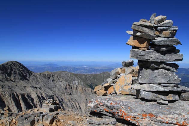 Mount Olympus Mount Olympus is the highest mountain range in Greece The massif is located on the east coast of Greece on the borderline between Macedonia and Thessaly, near the city of Katerini and the town of Litochoro In mythology, Mount Olympus is the seat of the Olympic