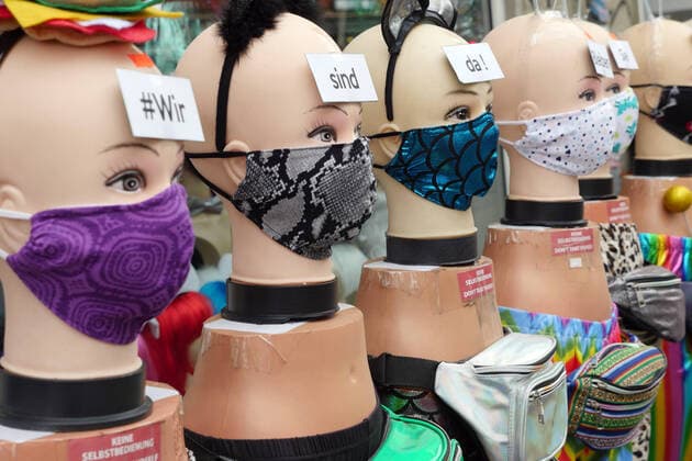 222 05 2020, Berlin Germany For the fight against the Corona Virus this shop offers face masks, like a small army the models are exhibited