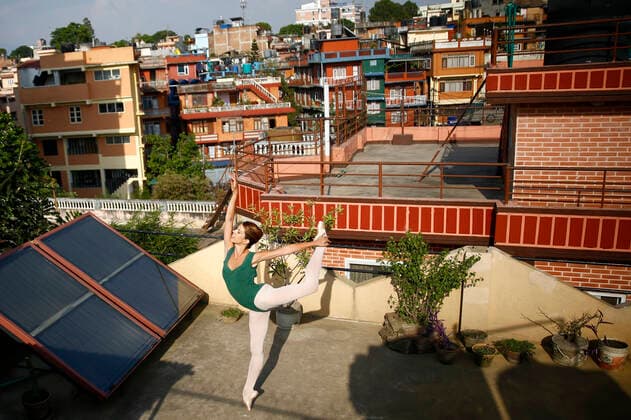 May 24, 2020, Kathmandu, Nepal: Alize Biannic, a French ballet dancer practicing ballet in the rooftop of her home on the 62nd day of government imposed nationwide lockdown amid concerns over the spread of coronavirus (COVID-19) infection in Kathmandu, Nepal on Sunday, May 24, 2020. Alize started ballet when she was 10 years old and has been teaching in Nepal since 2014. During the lockdown she has been giving online training and classes to company members and students in UK and France. If we stop training more than 3 days then it will take more than a month to get the technique back says Alize. Kathmandu Nepal - ZUMAg200 20200524_zap_g200_001 Copyright: xSkandaxGautamx