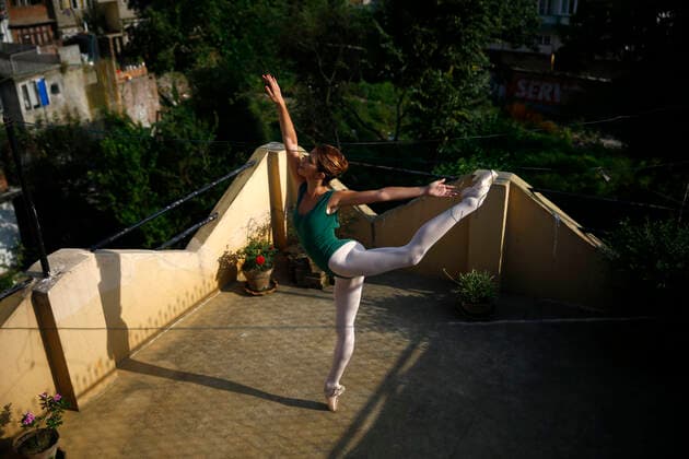 May 24, 2020, Kathmandu, Nepal: Alize Biannic, a French ballet dancer practicing ballet in the rooftop of her home on the 62nd day of government imposed nationwide lockdown amid concerns over the spread of coronavirus (COVID-19) infection in Kathmandu, Nepal on Sunday, May 24, 2020. Alize started ballet when she was 10 years old and has been teaching in Nepal since 2014. During the lockdown she has been giving online training and classes to company members and students in UK and France. If we stop training more than 3 days then it will take more than a month to get the technique back says Alize. Kathmandu Nepal - ZUMAg200 20200524_zap_g200_005 Copyright: xSkandaxGautamx