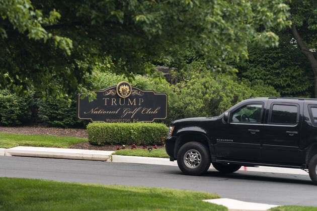 The motorcade ferrying President Donald Trump turns into the Trump National Golf Club in Sterling, Virginia, on Sunday, May 24, 2020. This is the second time in two days the president has visited his golf club near Washington, DC. He played golf on Saturday, the first time since the lockdown over the coronavirus COVID-19 pandemic. Nearly 100,000 Americans have died due to the novel virus.  WAX20200524104 JIMxLOxSCALZO
