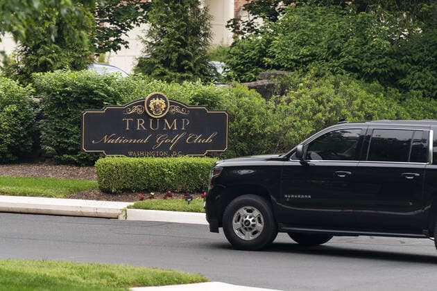 The motorcade ferrying President Donald Trump turns into the Trump National Golf Club in Sterling, Virginia, on Sunday, May 24, 2020. This is the second time in two days the president has visited his golf club near Washington, DC. He played golf on Saturday, the first time since the lockdown over the coronavirus COVID-19 pandemic. Nearly 100,000 Americans have died due to the novel virus.  WAX20200524103 JIMxLOxSCALZO