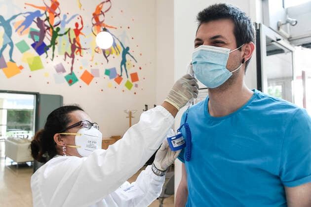 May 29, 2020, Brescia, Brescia, Italy: Coronavirus Emergency - Phase two The blood donation with new safety laws temperature control before donation Brescia Italy - ZUMAb205 20200529_zip_b205_007 Copyright: xMatteoxBiattax
