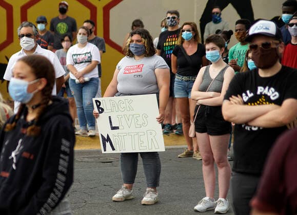 May 31, 2020, Albuquerque, NEW MEXICO, USA: 053120 ..Pilar Monfiletto , center holds a sign during a rally to protest against Police Brutality in light of the recent killings of African- Americans .Photographed on Sunday May 31, 2020.Adolphe Pierre-LouisJournal. Albuquerque USA - ZUMAab1_ 20200531_zaf_ab1_010 Copyright: xAlbuquerquexJournalx
