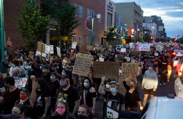 May 31, 2020, Albuquerque, NEW MEXICO, USA: 053120 ..Protesters hold signs as they block Central Ave in Downtown Albuquerque in light of the recent killing of George Floyd by police officers in Minneapolis .Photographed on Sunday May 31, 2020.Adolphe Pierre-LouisJournal. Albuquerque USA - ZUMAab1_ 20200531_zaf_ab1_013 Copyright: xAlbuquerquexJournalx
