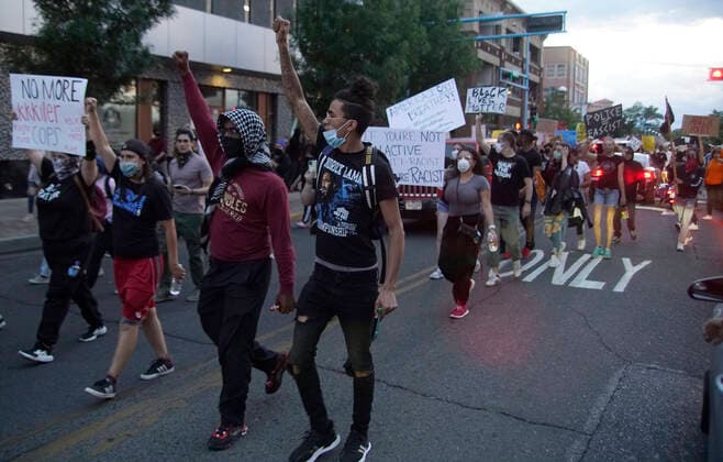 May 31, 2020, Albuquerque, NEW MEXICO, USA: 053120 ..Protesters hold signs as they block Central Ave in Downtown Albuquerque in light of the recent killing of George Floyd by police officers in Minneapolis .Photographed on Sunday May 31, 2020.Adolphe Pierre-LouisJournal. Albuquerque USA - ZUMAab1_ 20200531_zaf_ab1_014 Copyright: xAlbuquerquexJournalx