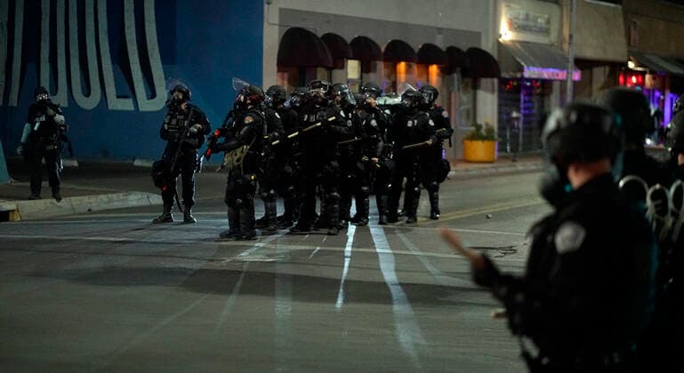 June 1, 2020, Albuquerque, NEW MEXICO, USA: 060120 ..Albuquerque Police Officers dressed in riot gear make block the intersection of Gold and 3rd Street in Downtown Albuquerque as they begin to clear the area after a peaceful rally turned violent l in light of the recent killing of George Floyd by police officers in Minneapolis .Photographed on Monday June 1, 2020.Adolphe Pierre-LouisJournal. Albuquerque USA - ZUMAab1_ 20200601_zaf_ab1_001 Copyright: xAlbuquerquexJournalx