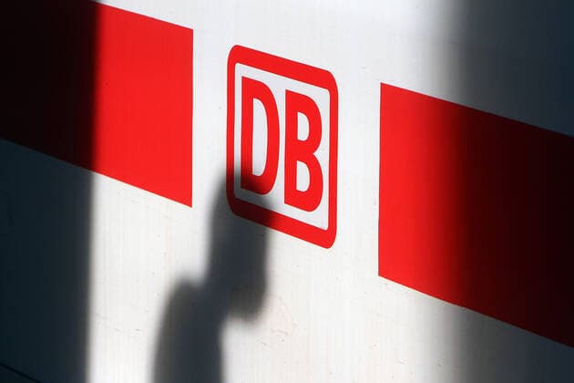 After the relaxation measures following the travel restrictions during the corona virus crisis, more people are again using DB Deutsche n Bahns long-distance trains Shadow of a passenger with a protective mask on an ICE Intercity Express at Frankfurt Central Station, Hesse, Germany