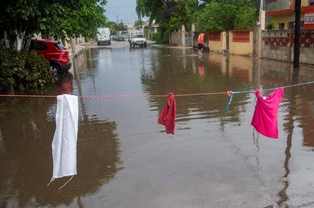 View of a flooded street in Merida, Yucatan state, Mexico, 02 June 2020. The tropical storm Cristobal will stay a couple of days in the southern area of the bay of Campeche, and will cause a storm of torrential rains on the coasts of the Gulf of Mexico, revealed on Tuesday the National Weather Service (SMN). After evolving into a tropical storm, Cristobal is located 215 kilometers northeast of Coatzacoalcos and 245 kilometers west-southwest of Campeche, in waters of the Gulf of Mexico, the SMN said in its bulletin at 16.15 hours (21.15 GMT). Tropical storm Cristobal will stay two days off the Mexican coast of Campeche !ACHTUNG: NUR REDAKTIONELLE NUTZUNG!  Copyright: xCuauhtémocxMorenox MEX2019 20200603-637267519362642155