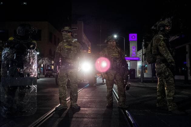 June 2, 2020, El Paso, Texas, United States: U.S. Customs and Border Patrol personnel stand in formation blocking road access to protestors gathering during a protest demanding justice for George Floyd in downtown El Paso, Texas. El Paso United States - ZUMAj106 20200602_zap_j106_009 Copyright: xJoelxAngelxJuarezx