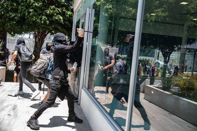 June 8, 2020, Xalapa, Veracruz, Mo xico: Hooded people and anarchists protest in the city of Xalapa in order to demand justice for the murder of Carlos Navarro, who lost his life within the state police separatives after being arrested. These protests join the international movement against police violence Xalapa MÃ xico - ZUMAqp1_ 20200608_zip_qp1_010 Copyright: xHectorxAdolfoxQuintanarxPerezx