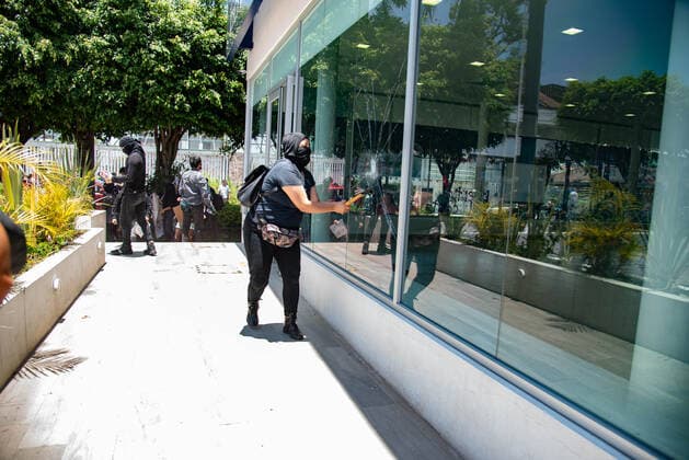 June 8, 2020, Xalapa, Veracruz, Mo xico: Hooded people and anarchists protest in the city of Xalapa in order to demand justice for the murder of Carlos Navarro, who lost his life within the state police separatives after being arrested. These protests join the international movement against police violence Xalapa MÃ xico - ZUMAqp1_ 20200608_zip_qp1_011 Copyright: xHectorxAdolfoxQuintanarxPerezx