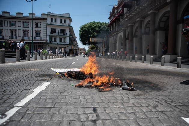 June 8, 2020, Xalapa, Veracruz, Mo xico: Hooded people and anarchists protest in the city of Xalapa in order to demand justice for the murder of Carlos Navarro, who lost his life within the state police separatives after being arrested. These protests join the international movement against police violence Xalapa MÃ xico - ZUMAqp1_ 20200608_zip_qp1_026 Copyright: xHectorxAdolfoxQuintanarxPerezx