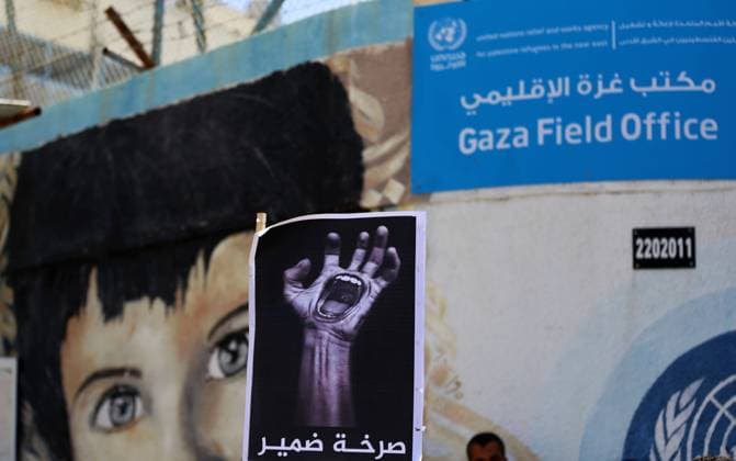 June 10, 2020, Gaza City, Gaza Strip, Palestinian Territory: Children of Palestinians formerly employed by United Nations Relief and Works Agency (UNRWA) take part in a protest demanding their fathers rights, outside its headquarter office, in Gaza City on June 10, 2020 Gaza City Palestinian Territory - ZUMAap3_ 20200610_zaf_ap3_074 Copyright: xMahmoudxNasserx