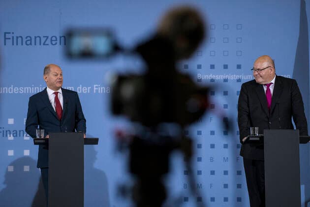 Finance Minister and Vice Chancellor Olaf Scholz SPD, left and Federal Minister of Economics Peter Altmaier CDU at a press conference on the implementation of the economic stimulus package on 12 June 2020 in the Ministry of Finance in Berlin Finance Minister Scholz on the implementation of the economic stimulus package