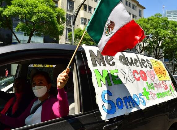 Hundreds of people take part in a caravan with their vehicles through the central avenues of Paseo de la Reforma and Juarez, to demand the resignation of President Andres Manuel Lopez Obrador, in Mexico City, Mexico, 14 June 2020. On board their cars, hundreds of Mexicans in various cities in the country protested this Sunday for the second time in less than three weeks against the president s policies. Second caravan of protest against Lopez Obrador in Mexico City !ACHTUNG: NUR REDAKTIONELLE NUTZUNG!  Copyright: xJorgexNúnezx AME6699 20200614-637277723232954610