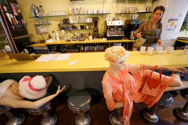 (200615) -- VANCOUVER, June 15, 2020 (Xinhua) -- Mannequins are used to block off seats at Roundel Cafe to give diners enough physical distance in Vancouver, British Columbia, Canada, on June 15, 2020. As restaurants were reopened under health safety protocols in Vancouver, the restaurant Roundel Cafe found its way by using mannequins instead of cordoned-off seats to help diners practice physical distancing. (Photo by Liang Sen Xinhua) CANADA-VANCOUVER-COVID-19-RESTAURANT-PHYSICAL DISTANCE 